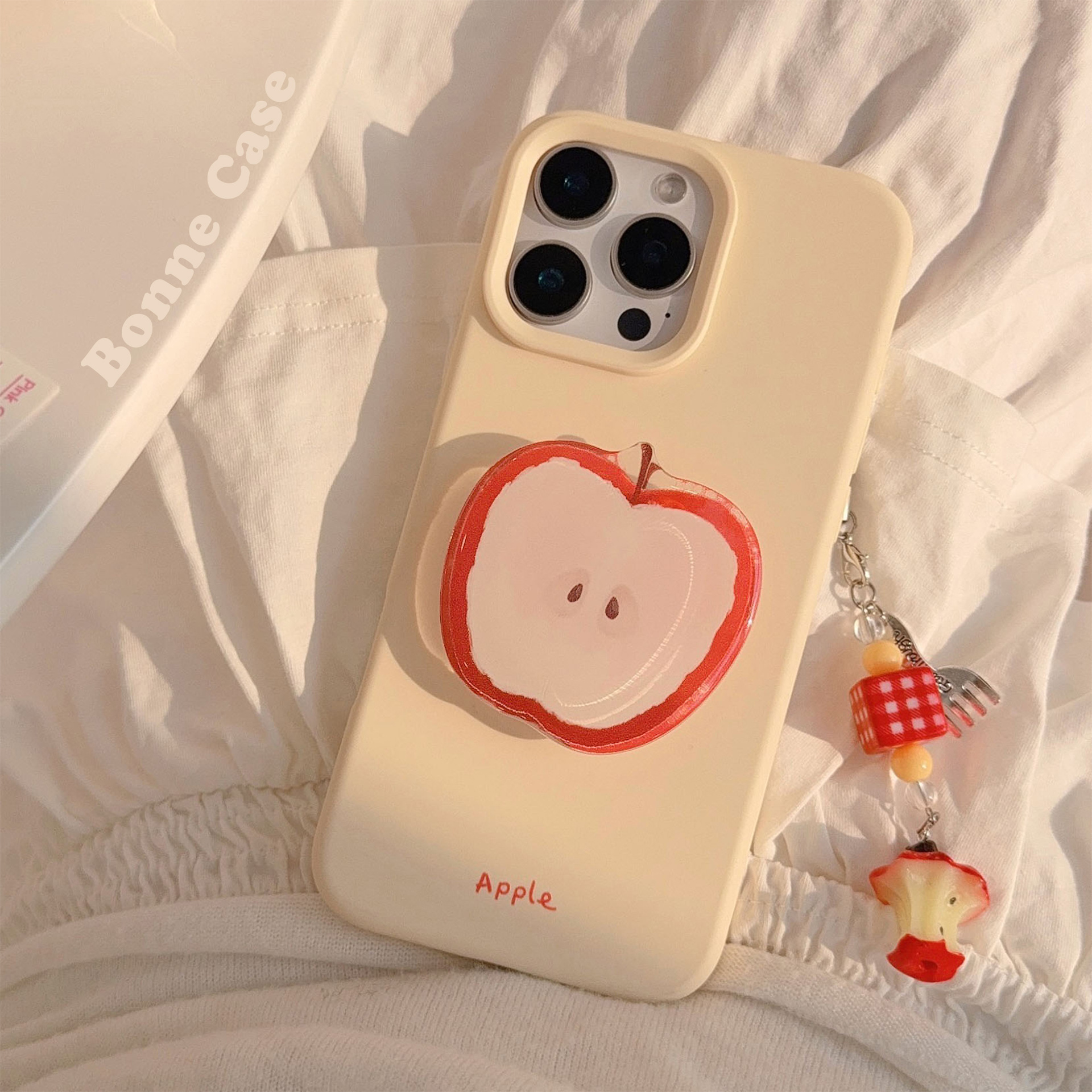 The red Apple stand is suitable for the iPhone 16promax phone case and iPhone 17. It is a niche summer 14 silicone 13 pendant