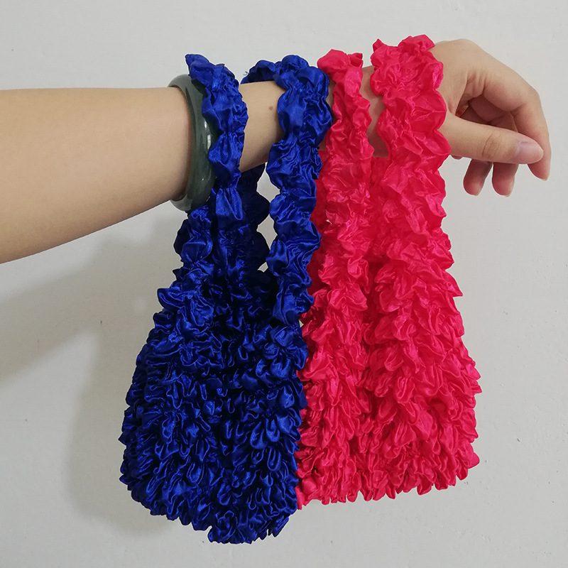 Jane Eyre New Wave Magic Stretch Silk Scarf Bag Chiffon Fold Shopping Bag Pineapple Bubble Bag Large Capacity Elastic Bag Application Scenario