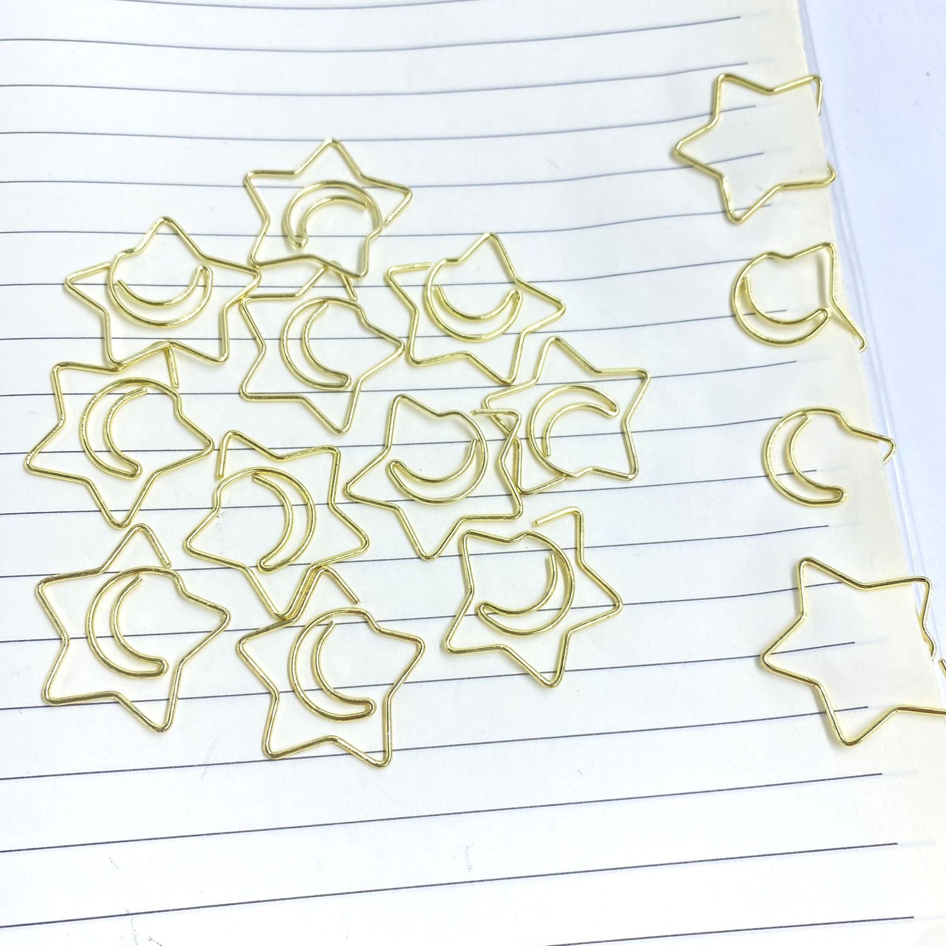 Wholesale of creative office supplies electroplated gold irregular-shaped paper clips, gold paper clips Specification image