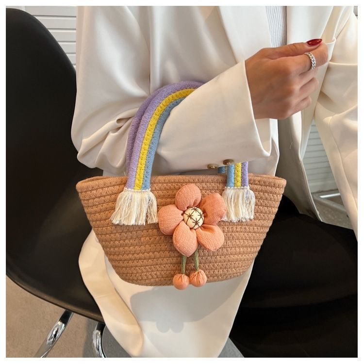 Korean-style trendy cotton rope handbag, a versatile and stylish handbag for Internet celebrities, a fresh and cute flower straw woven bag with a rainbow handle details Picture