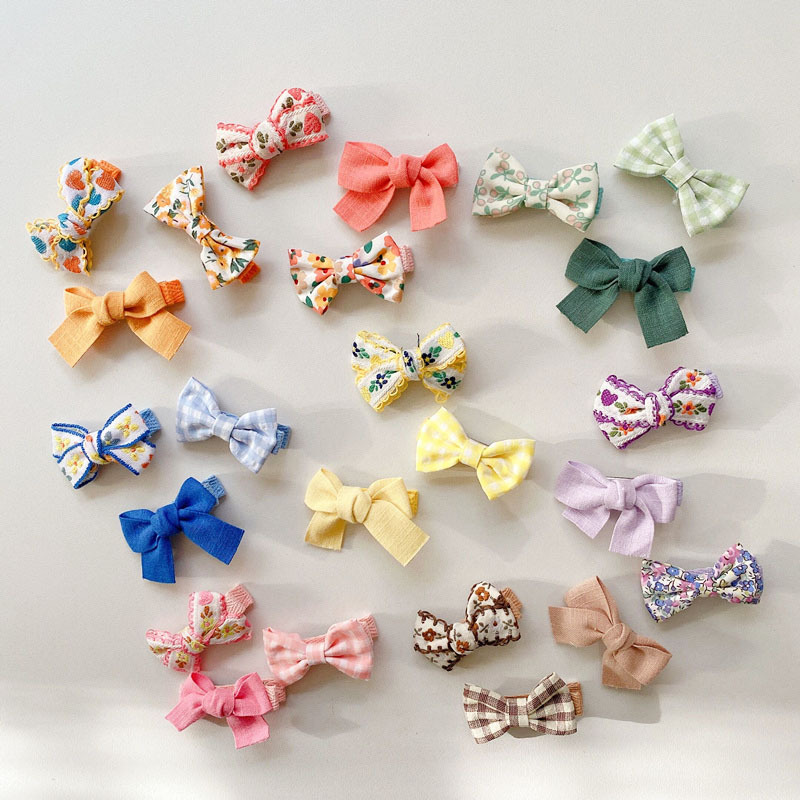 Children's Embroidery Fabric Bow Hair Clip Korean Baby Hair Clip Little Girl Headwear Side Bangs Broken Hair Clip Application Scenario