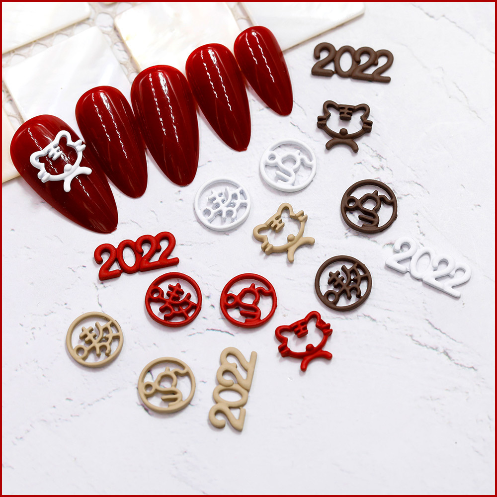 Cartoon tiger head cute fun metal electroplating spray paint New Year nail accessories