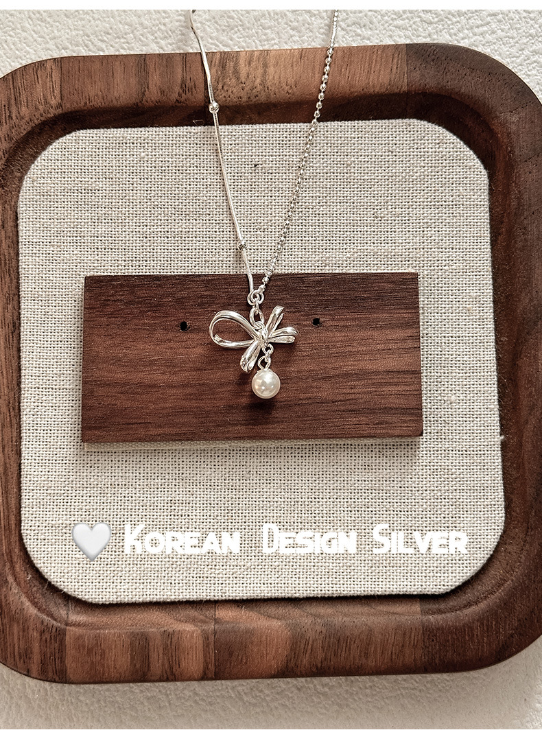 s925纯银蝴蝶结珍珠项链女轻奢精致小众设计感甜美拼接链条锁骨链详情2