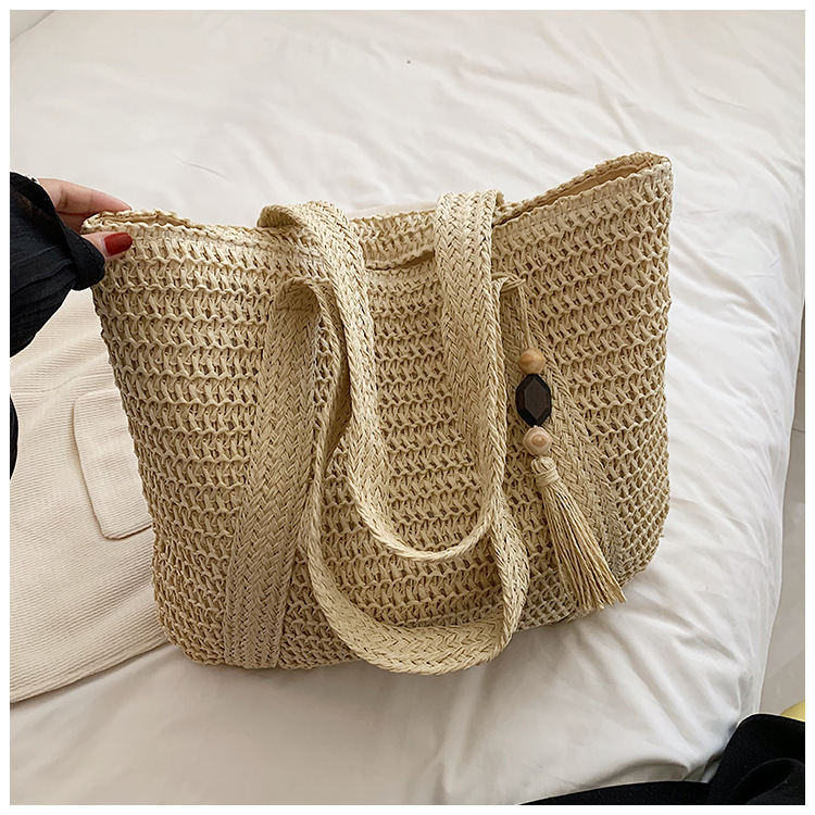 Cross-border bestsellers: Simple, large-capacity, lightweight woven bucket beach bag, new trendy straw woven hand-held bag and shoulder bag