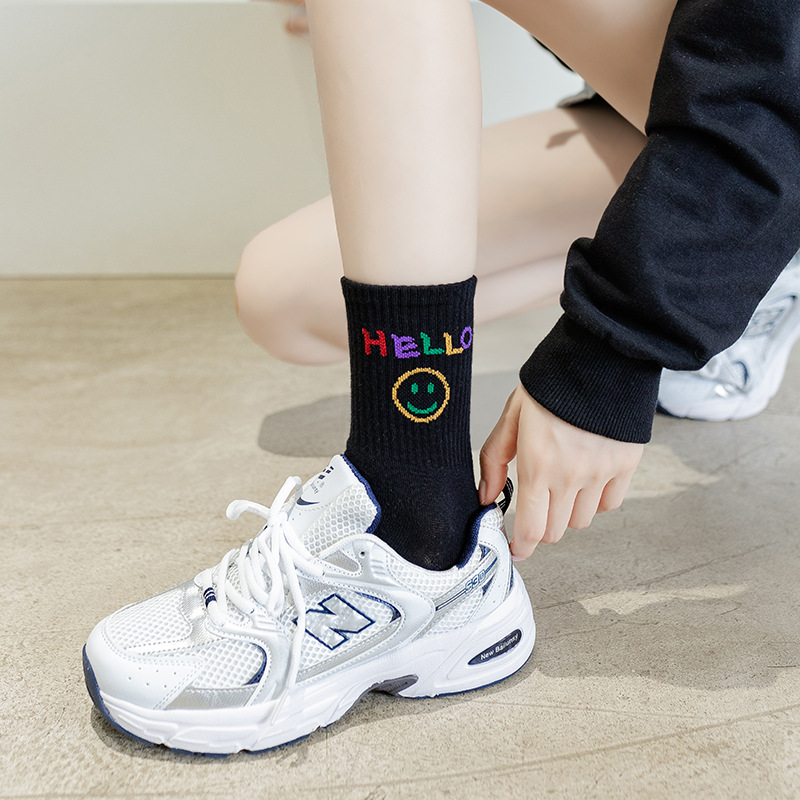 Women's mid-calf trendy brand spring and summer Japanese-style smiling black and white long calf socks, pure cotton versatile couple basketball sports socks Specification image