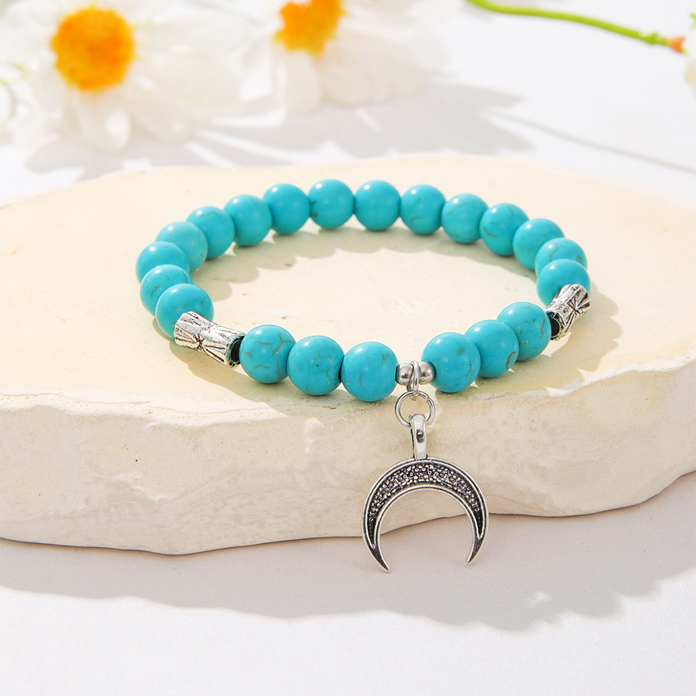 Europe And The United States Cross-Border Foreign Trade Sales Of New Fashion Women's Cross Butterfly Life Tree Leaves Turtle Pendant Turquoise Bead Elastic Bracelet Couple Bracelet Gift Manufacturers Wholesale Application Scenario