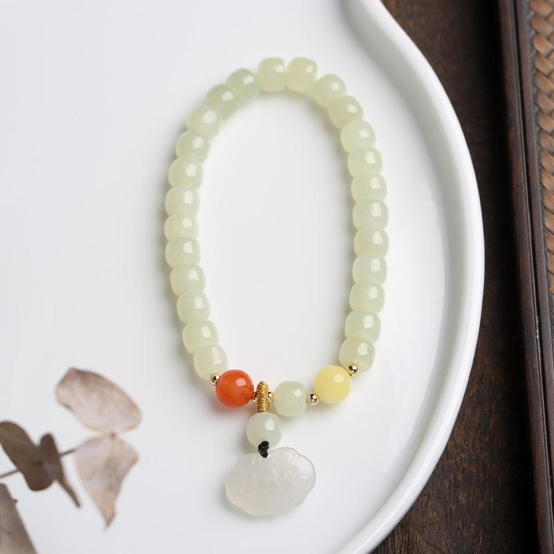 Natural Hetian jade bracelet paired with amber and red agate Hetian jade ruyi bracelet, a fresh and retro style women's accessory Application Scenario