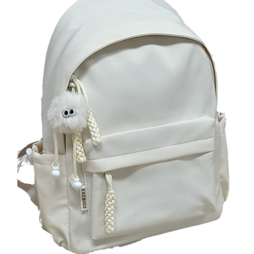 Japonés ins viento campus casual color sólido bolsa de la escuela de las mujeres simple versátil mochila ligera mochila para estudiantes universitarios de secundaria Item Picture