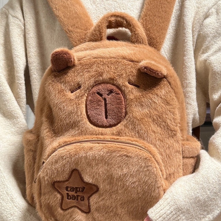 The 2024 new Capibara plush Capybara backpack is cute and versatile. It's a furry bag for girls and cartoon students