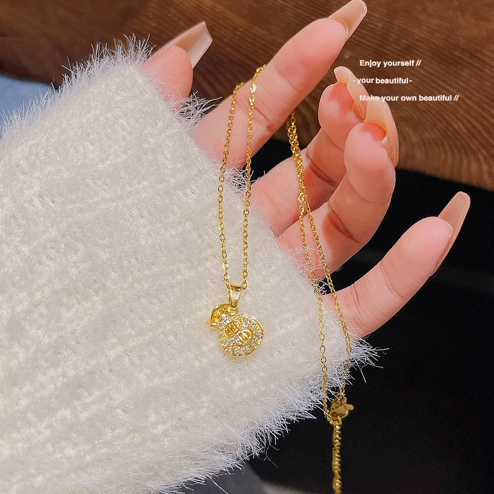 Lucky New Year Money Bag Titanium Steel Necklace Wholesale Do Not Fade Color Design Sense Collarbone Chain 2024 New Web Red Choker Application Scenario