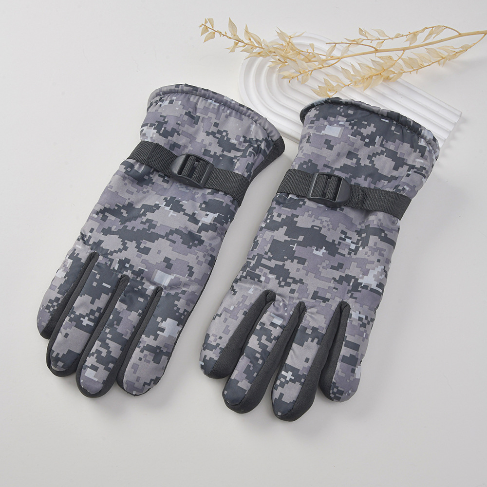 Gloves being tested on motorcycle handlebars in cold weather