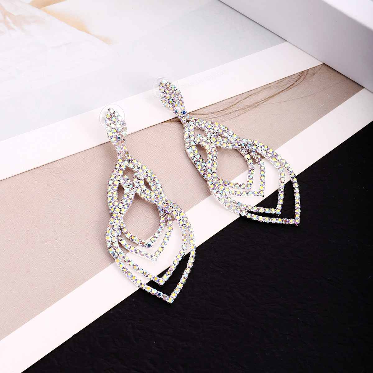 Wholesale of Japanese and Korean style personalized, fashionable and luxurious full-diamond earrings, long multi-layer teardrop-shaped welded earrings, and evening dress accessories Specification image