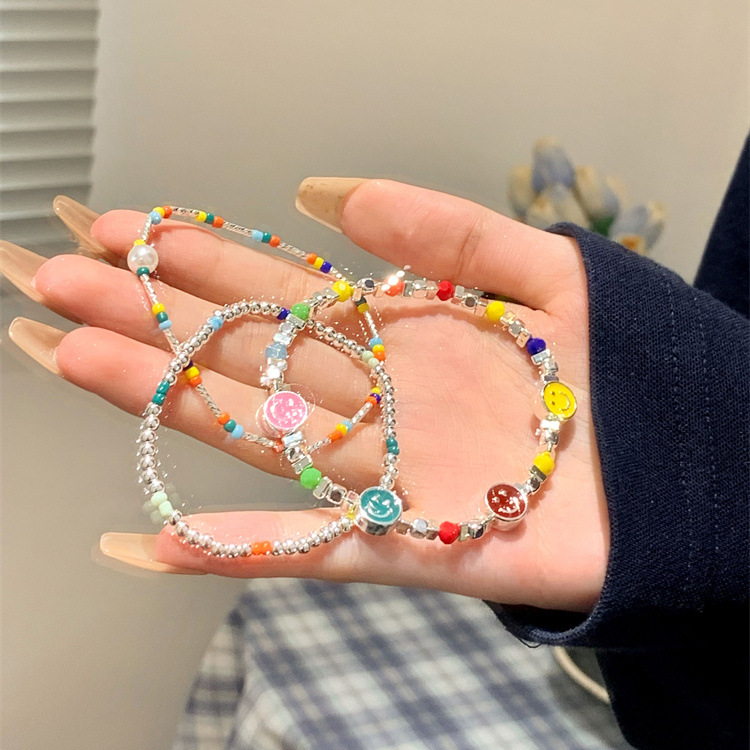 Dopamine-colored beaded smiling face bracelet for women, light luxury, niche, exquisite and unique design sense, best friend and student jewelry