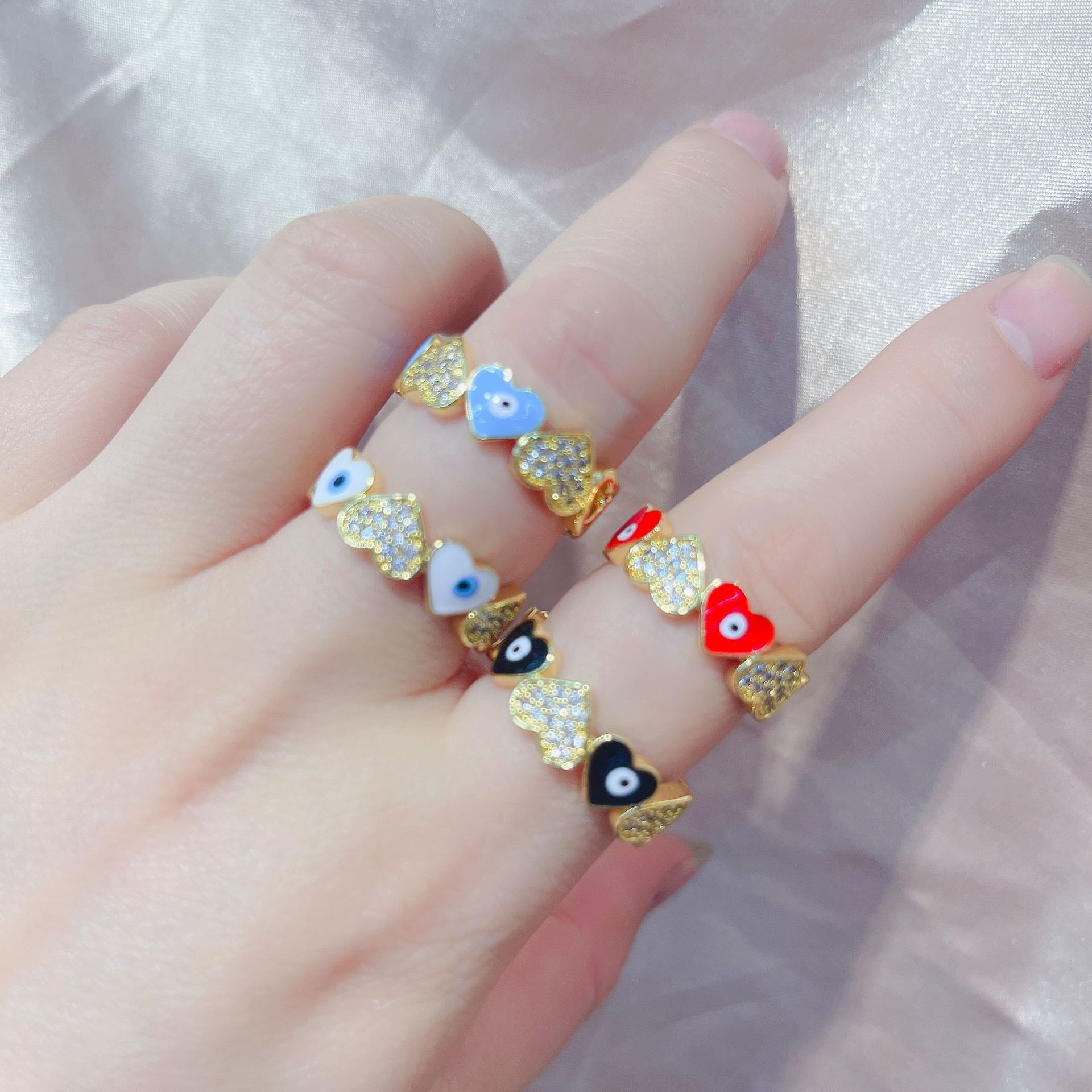 Cross-border Bohemian heart-shaped oil-infused eyes, devil's eyes, brass plated with real gold zircon fashionable open ring for women