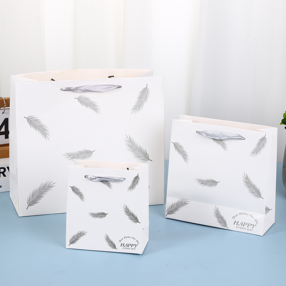 New gift bags, Christmas gift bags, paper bags, feather return gift bags, ribbon clothing bags, New Year gift bags