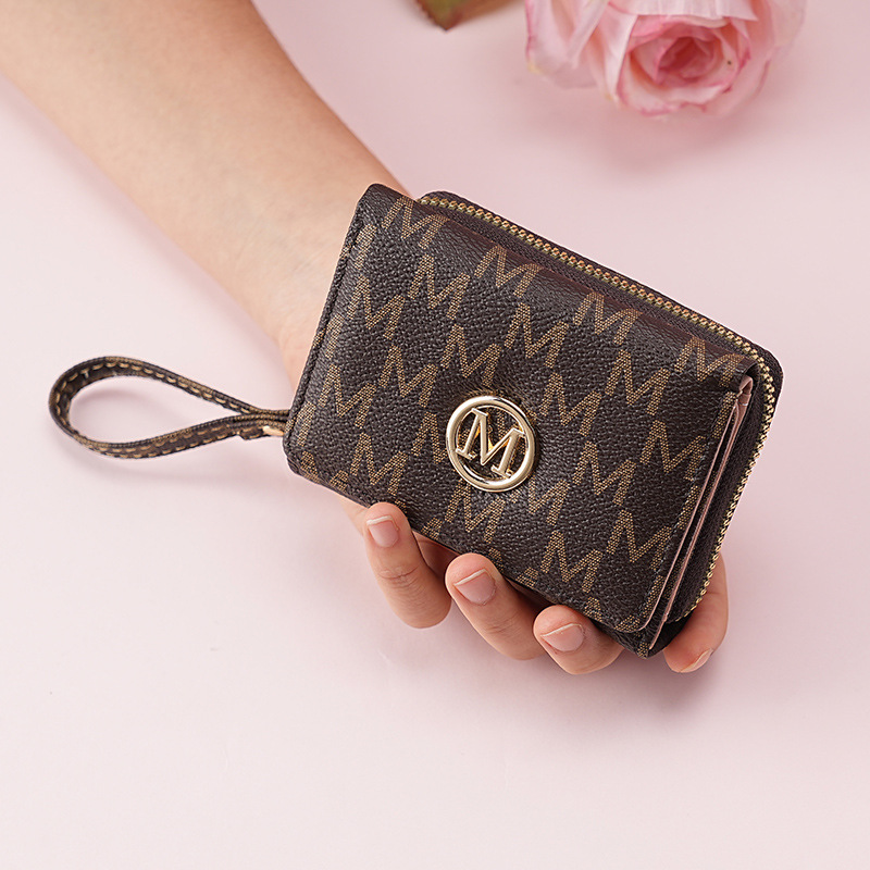 This is a new cross-border short women's wallet with a 30% discount zipper coin purse. It is simple and fashionable with an old pattern card bag details Picture