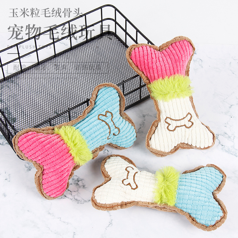 Venta directa de fábrica mascotas voz molar mordedura resistente gato perro peluche artículos de juguete de grano de maíz hueso estilo