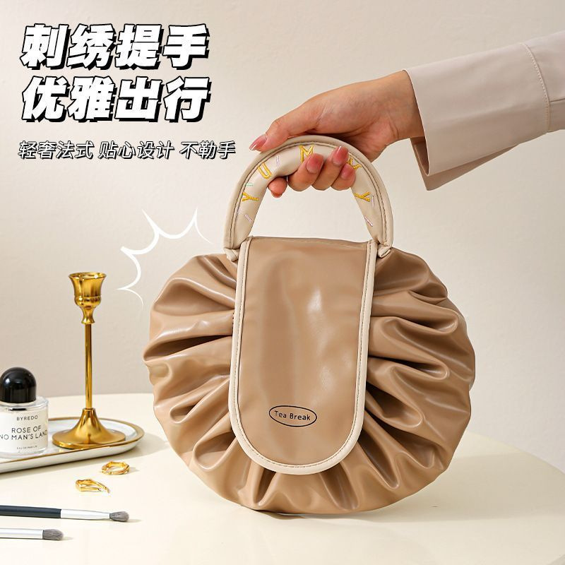 Lazy person's makeup bag, large-capacity waterproof portable storage bag for women, high appearance level, super large, light luxury, niche toiletry and travel bag Specification image