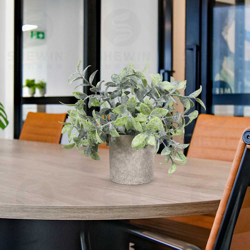 Xi Yun artificial potted Plant desktop cylindrical pulp pot frost-covered large tea leaves Green plant bonsai Cross-border artificial plant details Picture