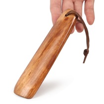 Solid wooden shoe puller