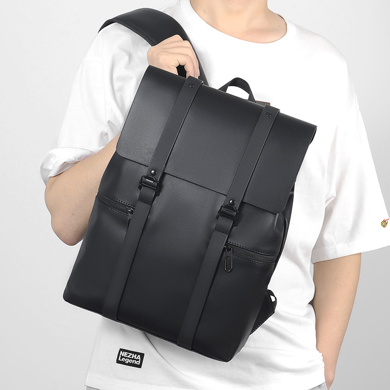 This simple and trendy double-shoulder computer bag for both men and women is fashionable and versatile. It has a large capacity and is a niche backpack with a PU waterproof leather film details Picture