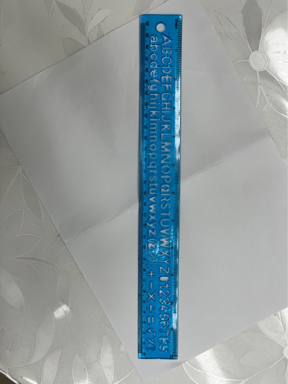 A 30cm flexible ruler with letters, made of PVC