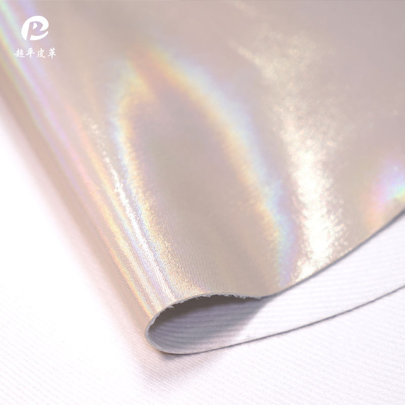 Iridescent laser leather is available for wholesale in stock. It features 0.8mm thick new European standard eco-friendly cotton-like fleece base fabric for luggage and pu leather fabric Specification image