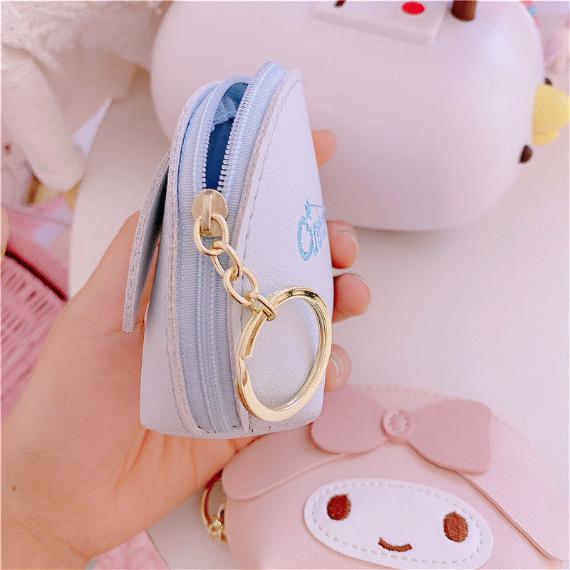 The cute and charming cartoon creative loose change bag is a simple, portable and multi-functional student storage small wallet by the popular Yugui Dog Application Scenario