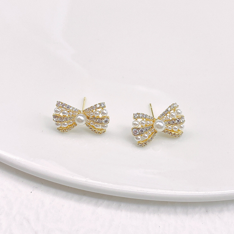 Obi new S925 silver needle pearl bow zircon advanced sense earrings fashion temperament sense female earrings niche details Picture