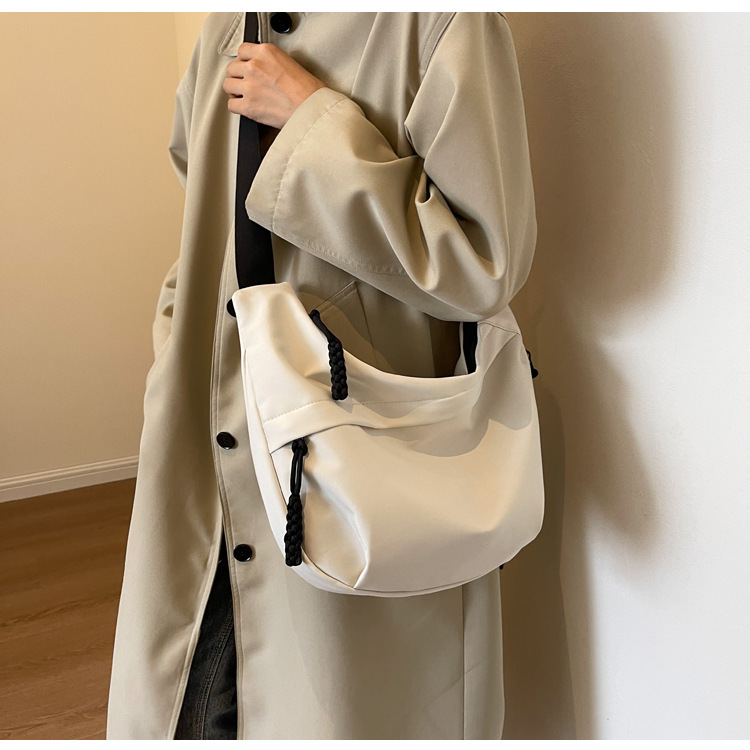 潮春新款大容量简约托特包女包单肩斜挎包时尚休闲箱包皮具男士包袋详情10