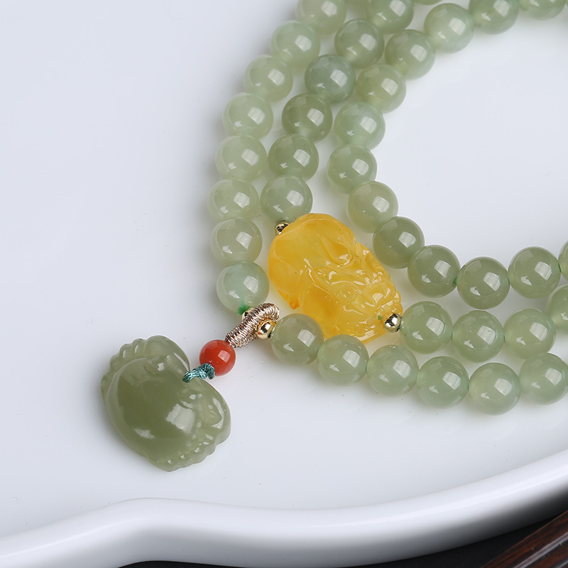 Natural three-circle Hetian jade crab-hanging bracelet, the richest in the world. Green jade amber PI Xiu multi-circle jade bracelet decoration details Picture