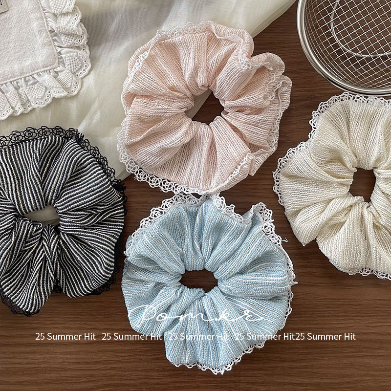 The new Korean-style simple and elegant lace-trimmed large intestine hair band is a versatile accessory for girls. The retro high-elasticity bun hair is perfect for women Specification image