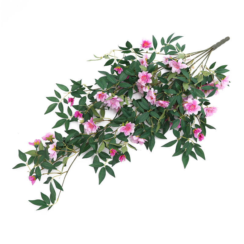Wholesale of creative three-dimensional wall hangings with artificial flower vines, cherry blossoms, green plants, peach blossoms and vines for balcony and wall decoration Application Scenario