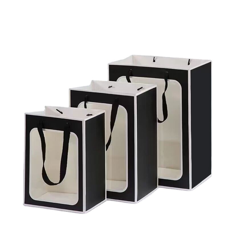 Wholesale of new creative windowed single-color handbags, square-bottom paper bags, hand-held paper bags, flower packaging bags and gift bags Item Picture