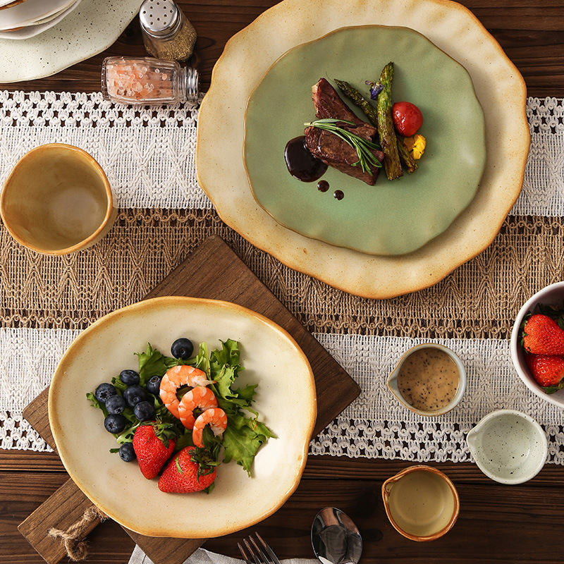 Retro-style rough pottery high-temperature resistant tableware, household vegetable plates, rice bowls, soup bowls, water cups, irregular-shaped kiln-transformed dinner plates, creative plating details Picture