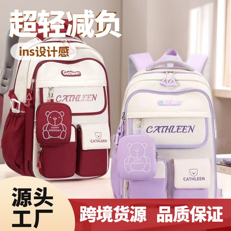 Cross-border leisure primary school students' backpacks, spine protection and burden reduction, large-capacity children's color-blocking backpacks, girls' and junior high school students' backpacks