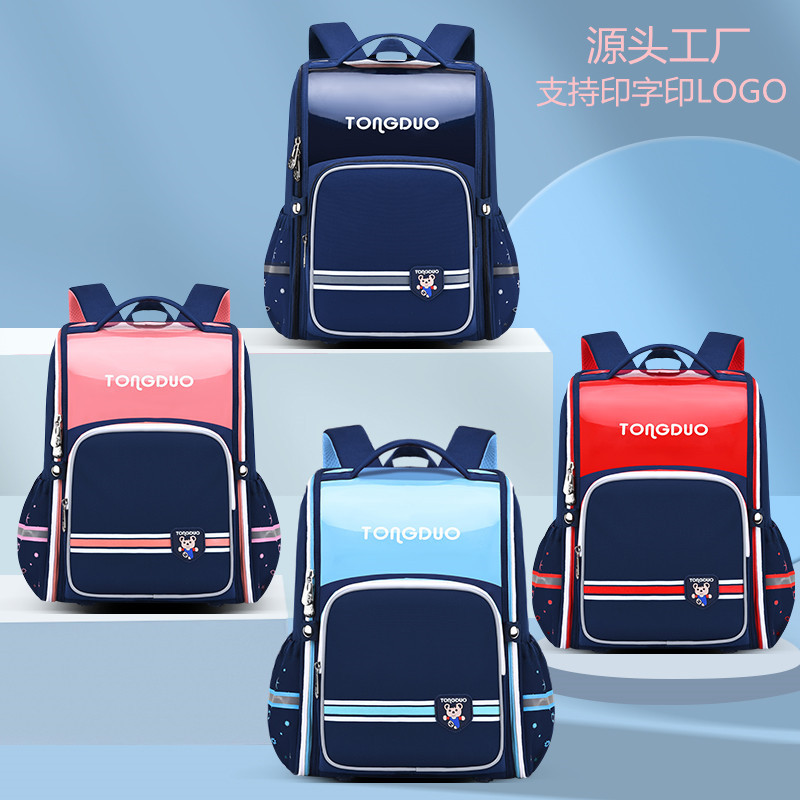 Tong Duo school bags for boys and girls kindergarten backpack wear-resistant and load-reducing 1-6 grade printing LOGO