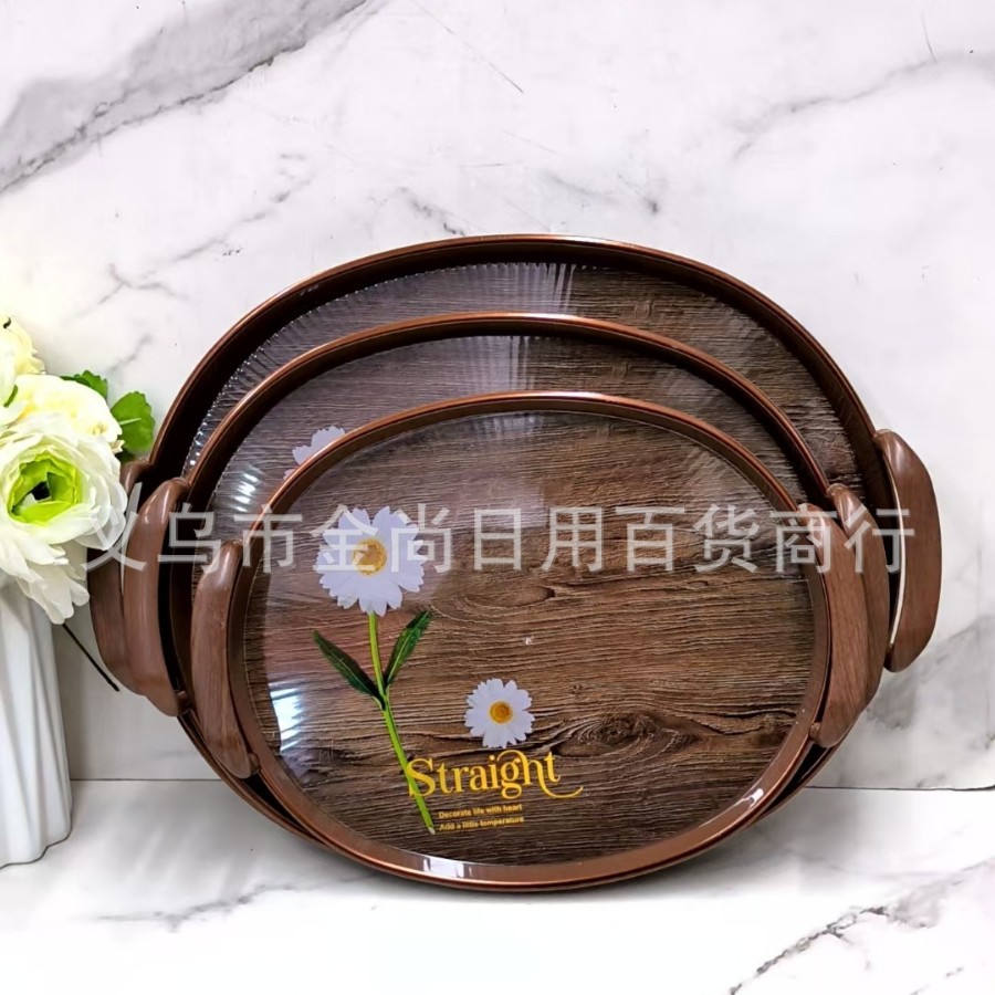 The oval-shaped plastic tray with a wood-grain handle can hold tea cups and fruit plates Item Picture