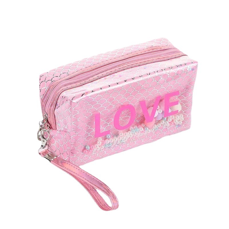 Japanese and Korean style iridescent fish-scale pattern cosmetic bag, popular creative design sense toiletry bag, portable LOVE storage bag batch Application Scenario