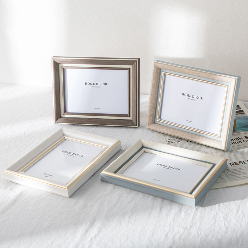 北欧ins风10寸相框摆台批发67寸8寸A4摆台挂墙照片框影楼diy画框