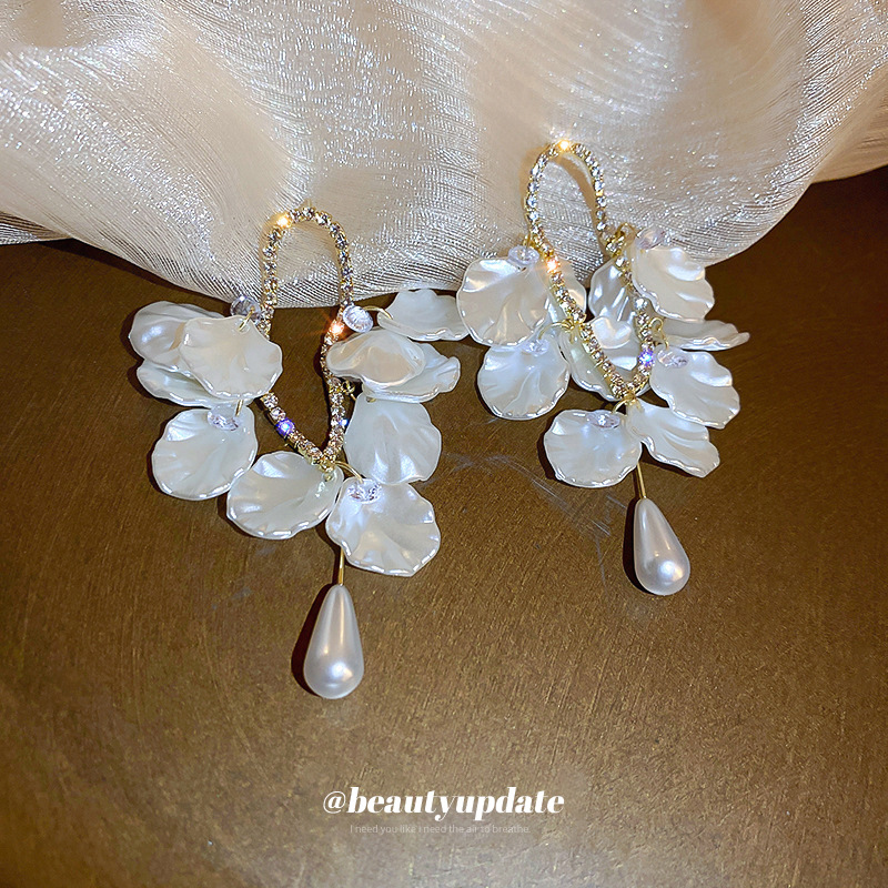 Silver needle, pearl, flower, shell, long tassel earrings, light luxury and fashionable design sense, high-end earrings wholesale Specification image