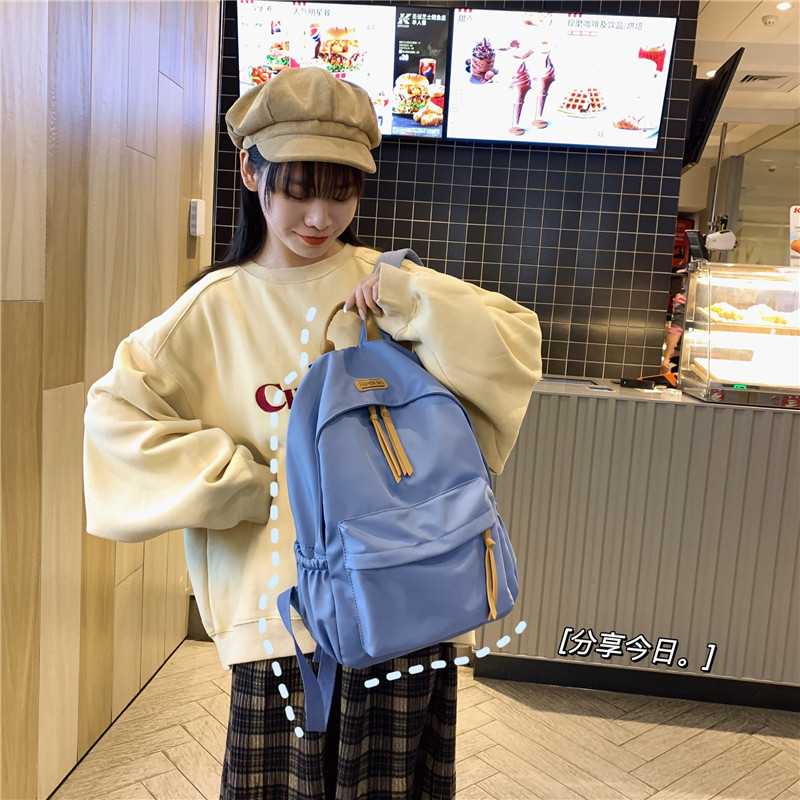 New Korean-style schoolbag for girls, simple and elegant, cute backpack for middle school and college students, travel bag with a sense of luxury Application Scenario