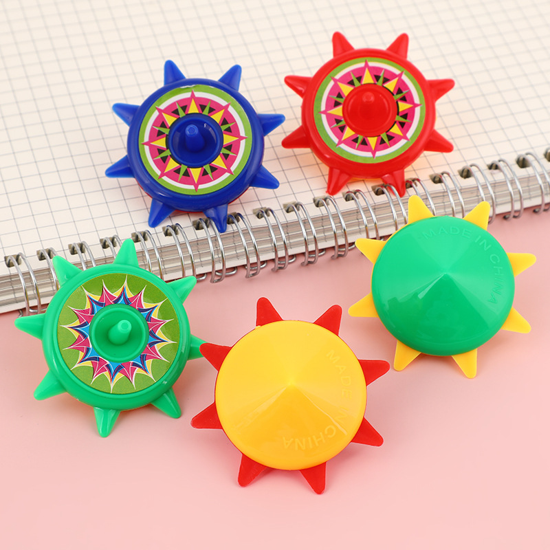 Yiwu manufacturer's octagonal ground spinning children's plastic small toys, boys and girls' hand-spinning tops, kindergarten gifts Specification image