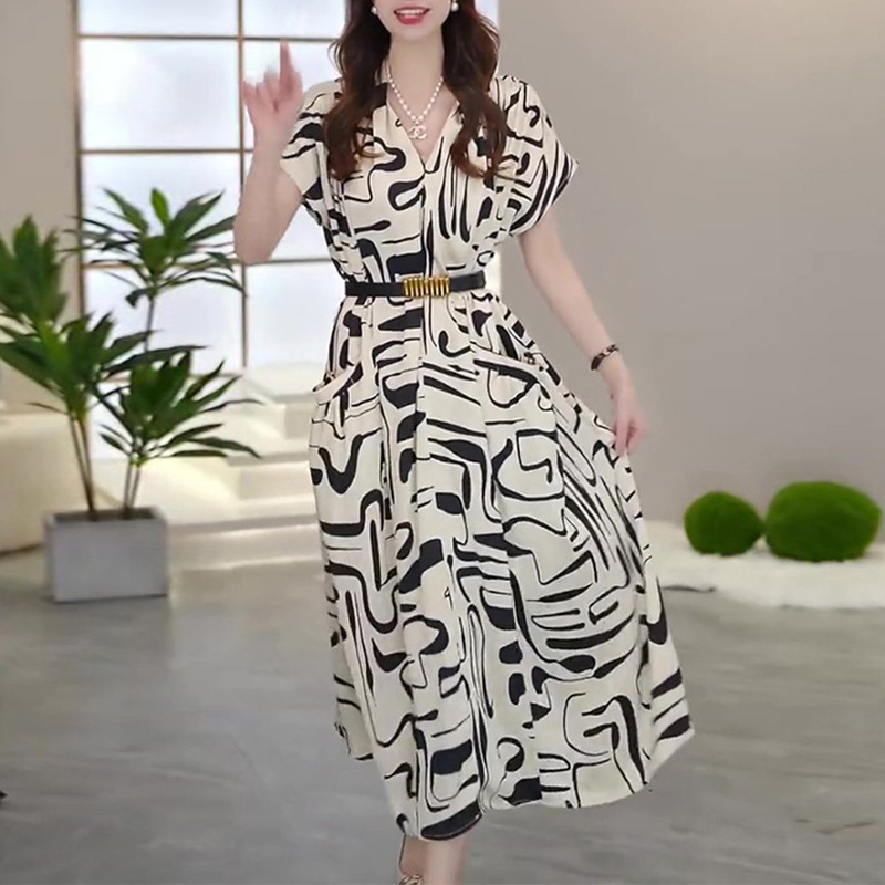 This high-end, elegant and unique V-neck dress is a new summer style for women in 2024. It features a youthful printed mid-length A-line dress Application Scenario