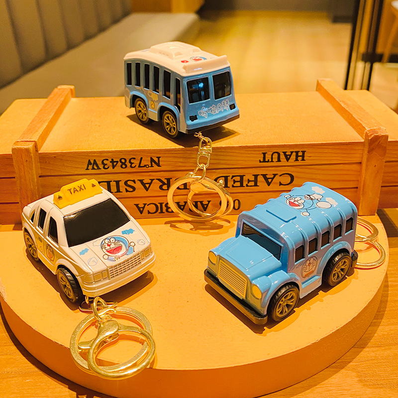 Wholesale of cartoon cute Doraemon toy cars, creative keychains, student schoolbags, pendants and couple small gifts Specification image