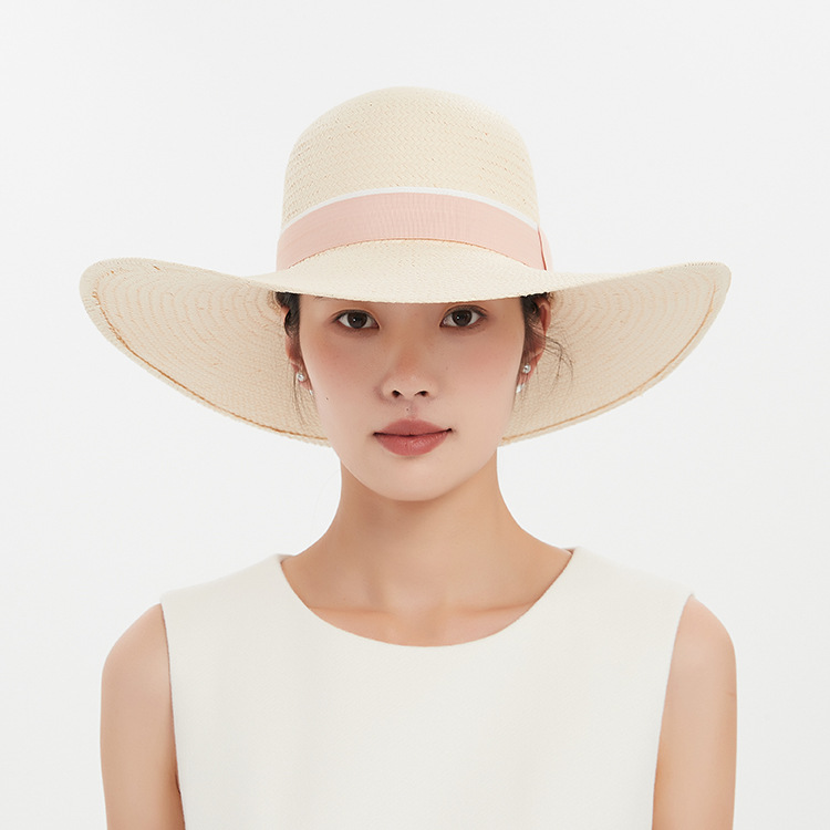 女士春夏款米色纯手工编织帽粉色装饰外出游度假遮阳防晒太阳帽沙
