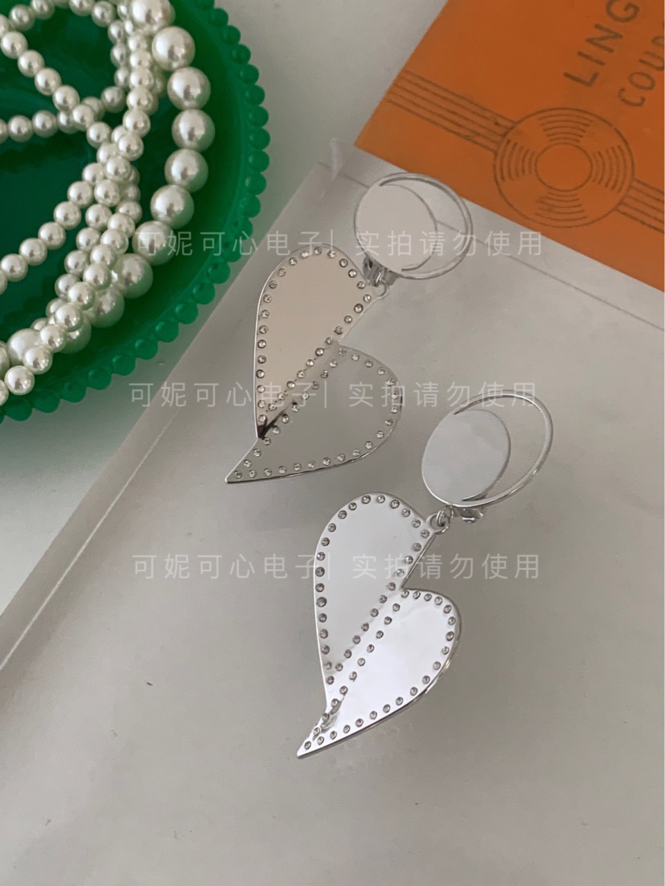 23新款工艺很复杂的一款耳夹爱心对折工作光面有略痕单只银色B2/2详情7