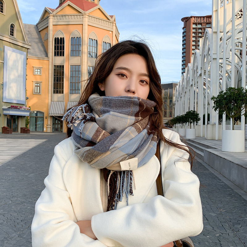 The new Korean checkered scarf for women in 2024 is a faux cashmere retro checkered tassel scarf shawl