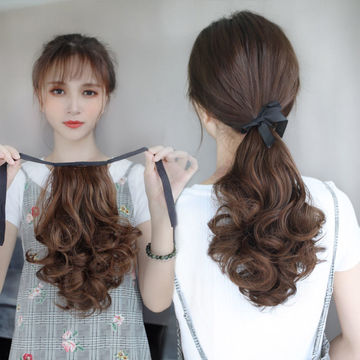 Long and short wig pieces for women with long curly hair in a ponytail with straps and a pear blossom false ponytail
