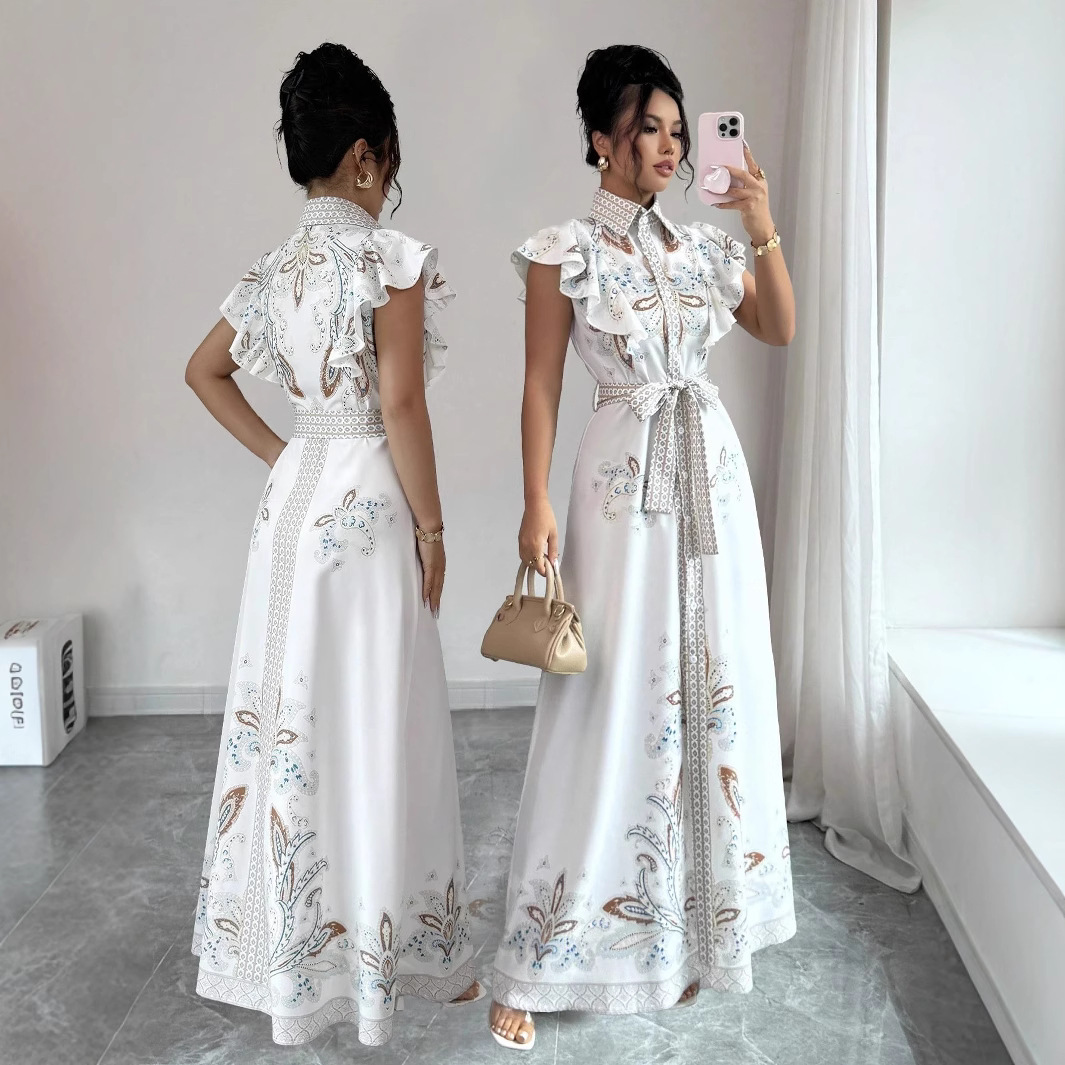 This is a new spring and autumn collection of a retro court-style printed long-sleeved, waist-cinching, wide-swing long dress with a fashionable single-breasted stand-up collar full figure